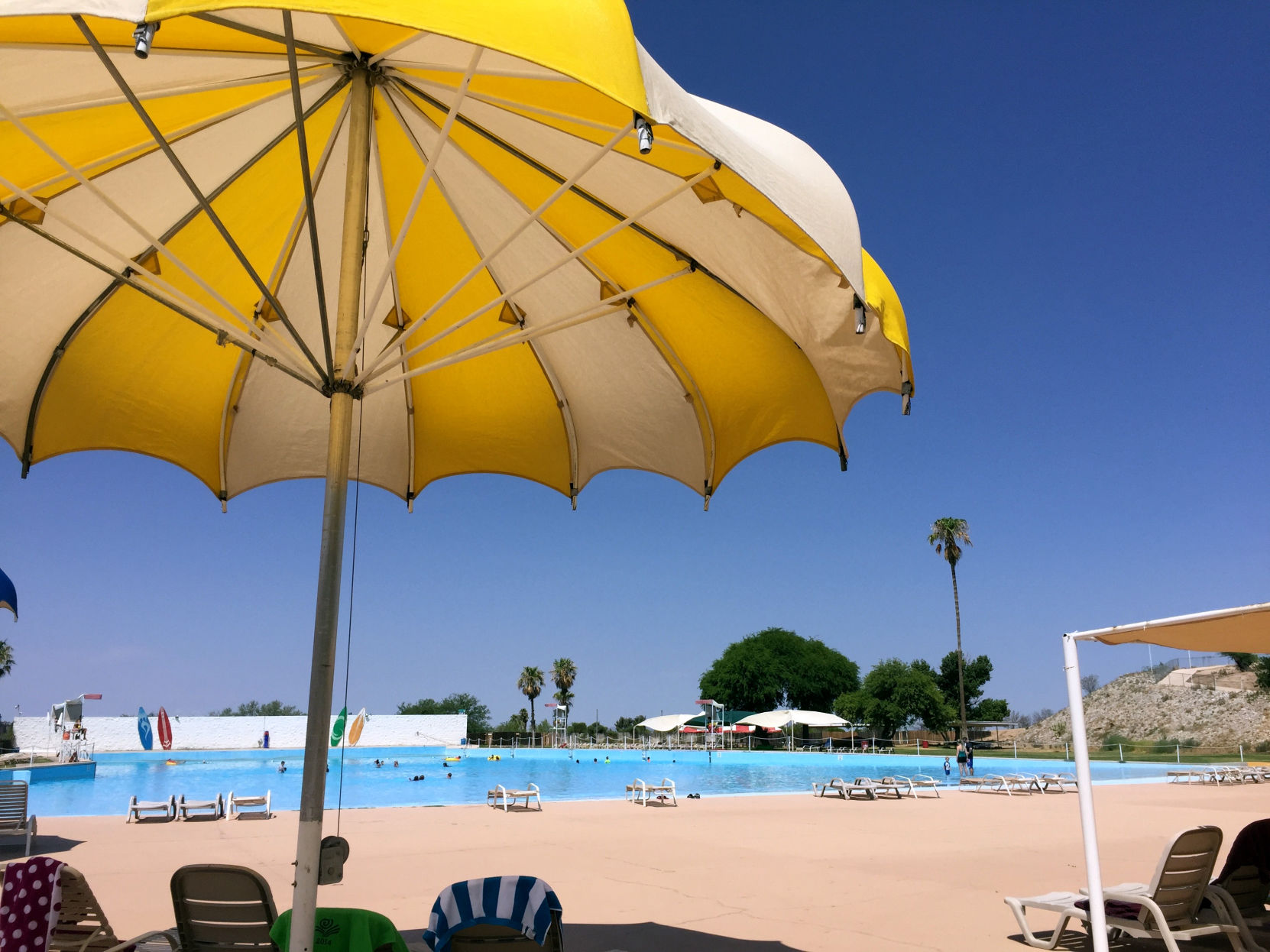 Breakers Water Park wave pool and umbrella